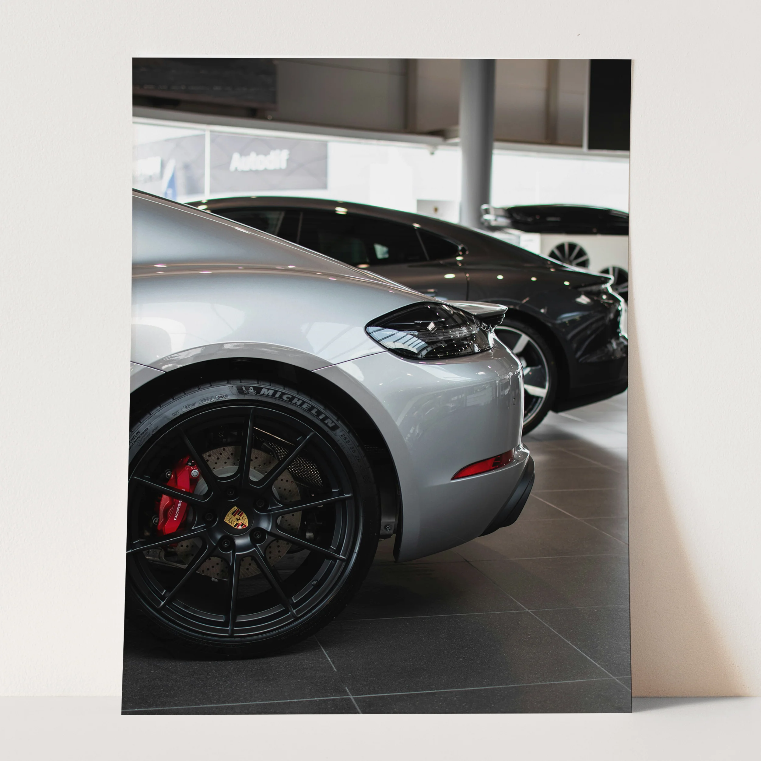 Silver Porsche in the Showroom - Image 3